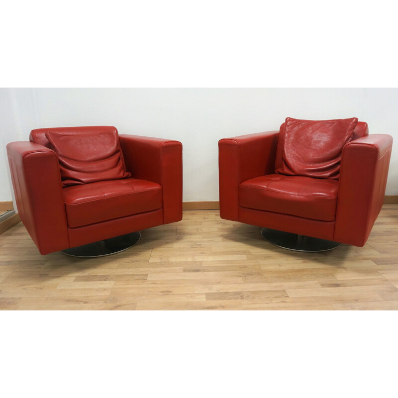 Pair of vintage red leather armchairs