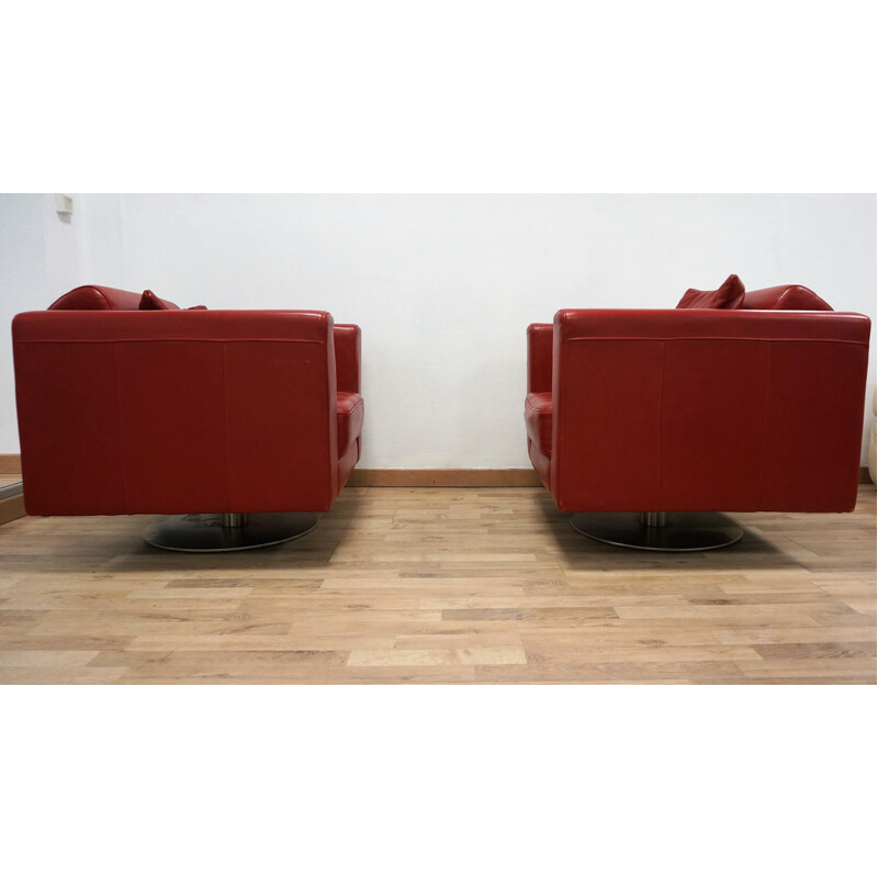 Pair of vintage red leather armchairs