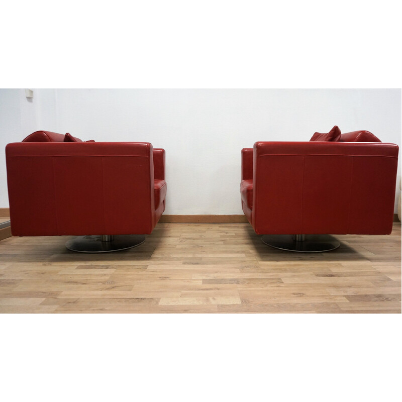 Paire de fauteuils rouges vintage en cuir