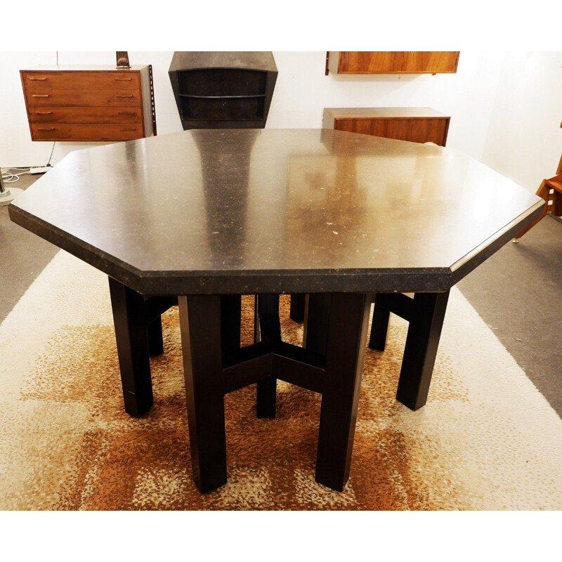 Black stone dining table by Ado Chale