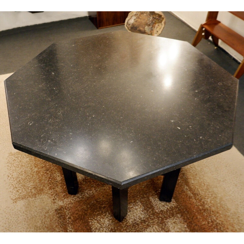 Black stone dining table by Ado Chale