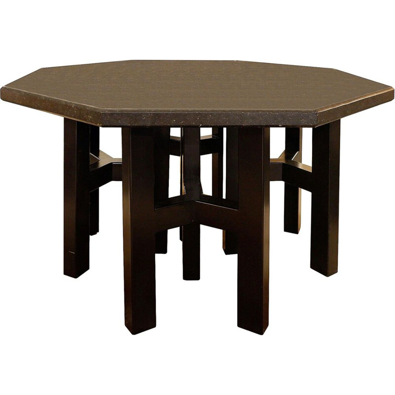 Black stone dining table by Ado Chale