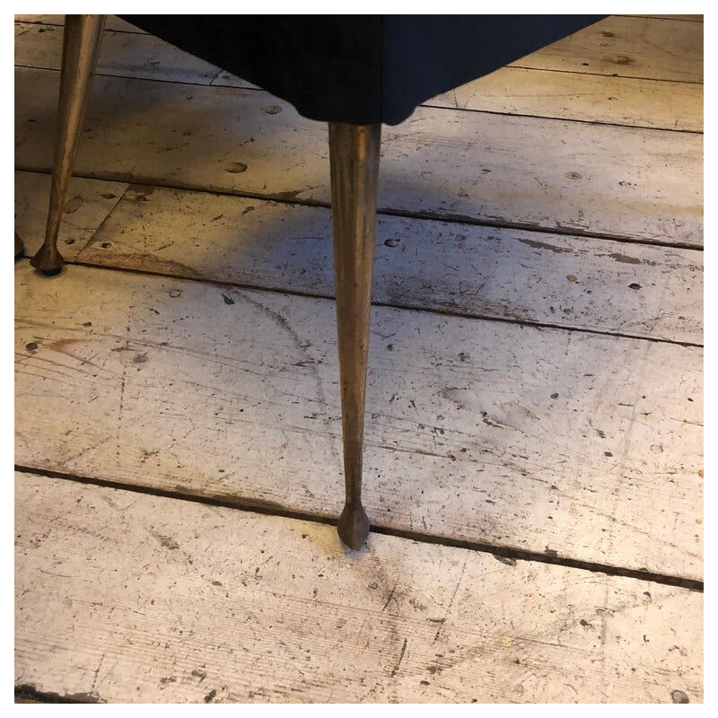 Vintage living room in black velvet and brass 1950s