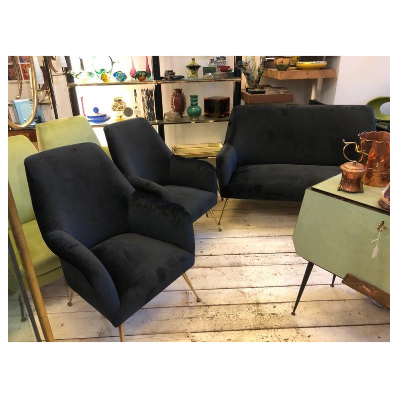 Vintage living room in black velvet and brass 1950s