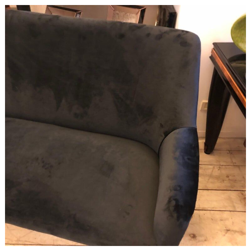 Vintage living room in black velvet and brass 1950s