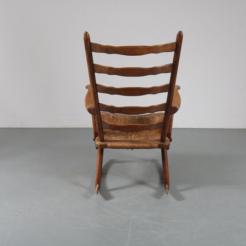 Vintage rocking chair in wood by De Ster Gelderland, Netherlands 1950s