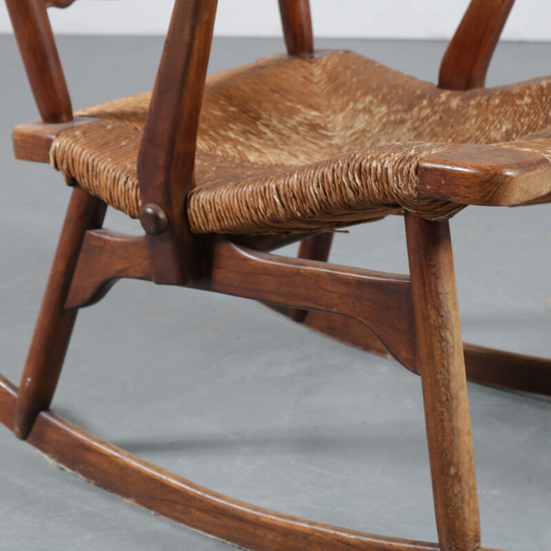 Vintage rocking chair in wood by De Ster Gelderland, Netherlands 1950s