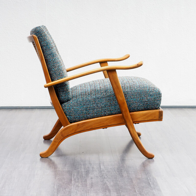 Vintage armchair in cherrywood and fabric 1950s