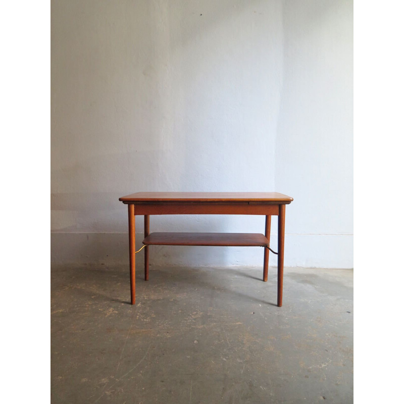 Vintage coffee table extendable in teak with lower shelf 1950s