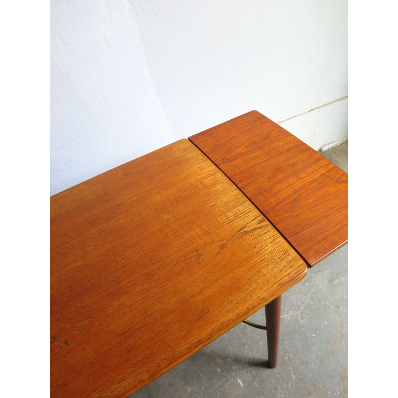 Vintage coffee table extendable in teak with lower shelf 1950s