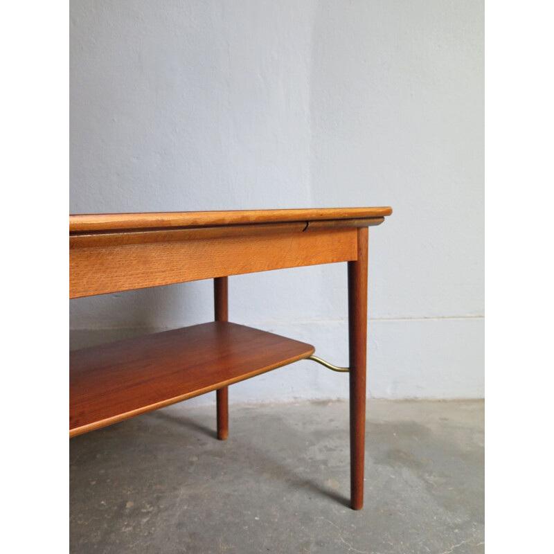 Vintage coffee table extendable in teak with lower shelf 1950s