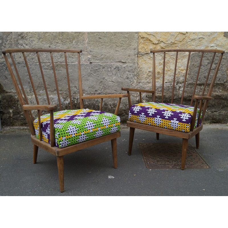 Pair of vintage Baumann armchairs in wood and fabric