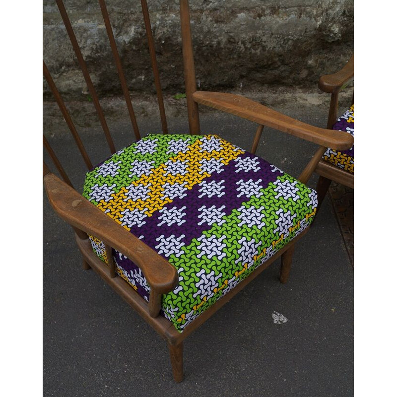 Pair of vintage Baumann armchairs in wood and fabric