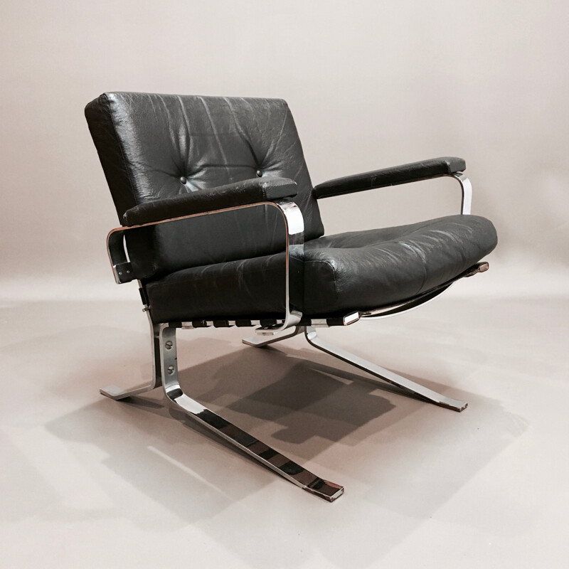 Vintage armchair black leather and chrome 1960