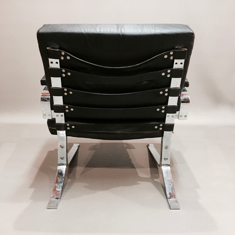 Vintage armchair black leather and chrome 1960