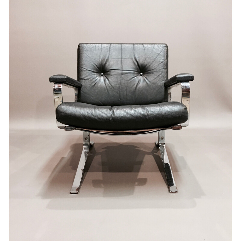 Vintage armchair black leather and chrome 1960
