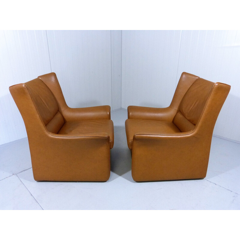 Set of vintage lounge chairs with footstool in leather, Italy 1960s