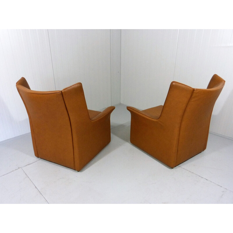 Set of vintage lounge chairs with footstool in leather, Italy 1960s