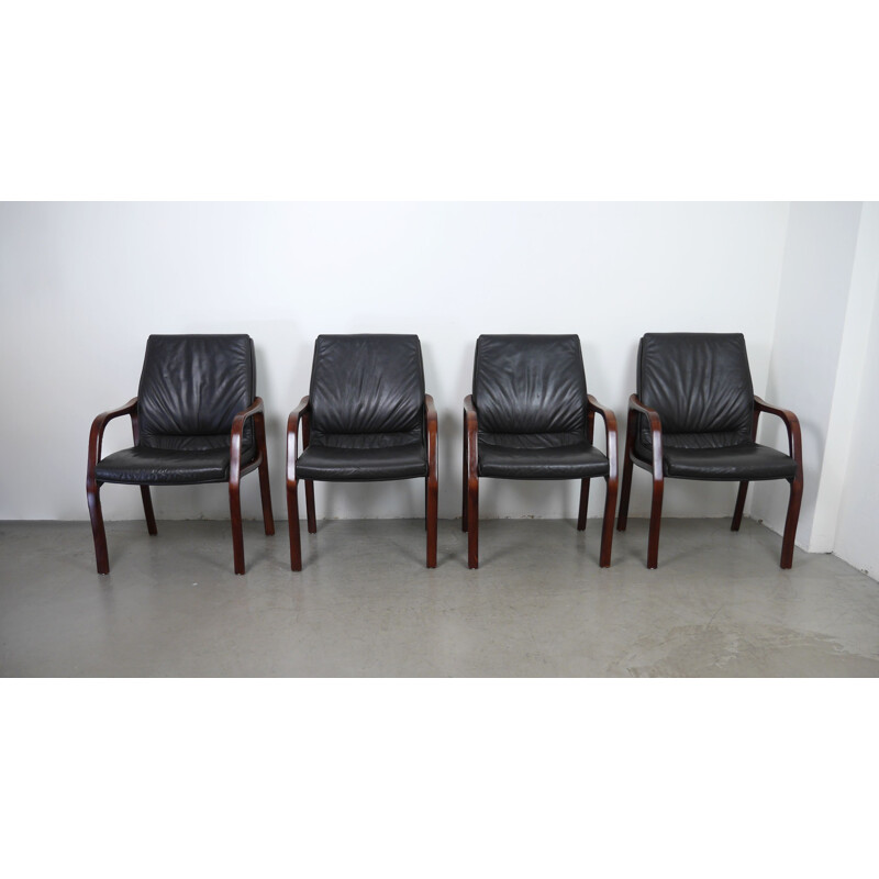 Set of 4 vintage armchairs in leather and mahogany, Germany 1970s