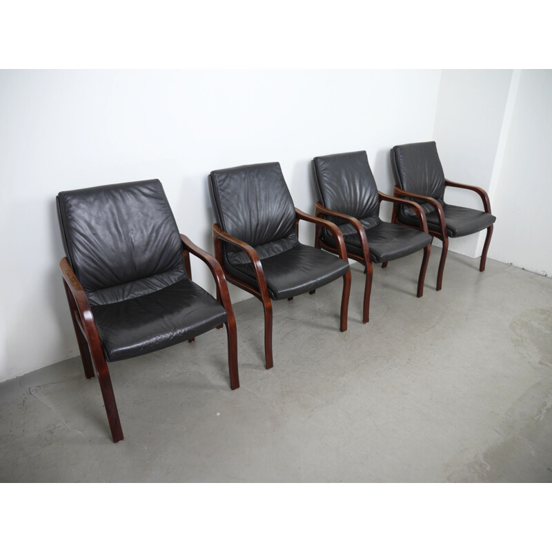 Set of 4 vintage armchairs in leather and mahogany, Germany 1970s