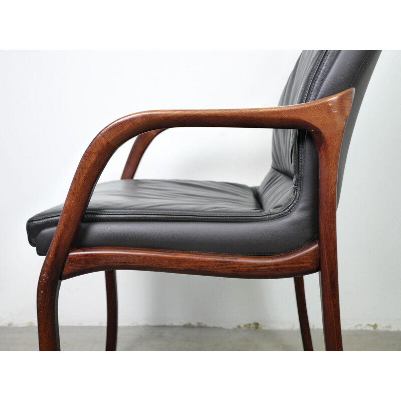 Set of 4 vintage armchairs in leather and mahogany, Germany 1970s