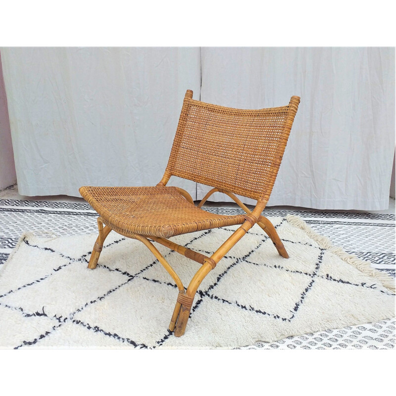 Vintage armchair in rattan 1970