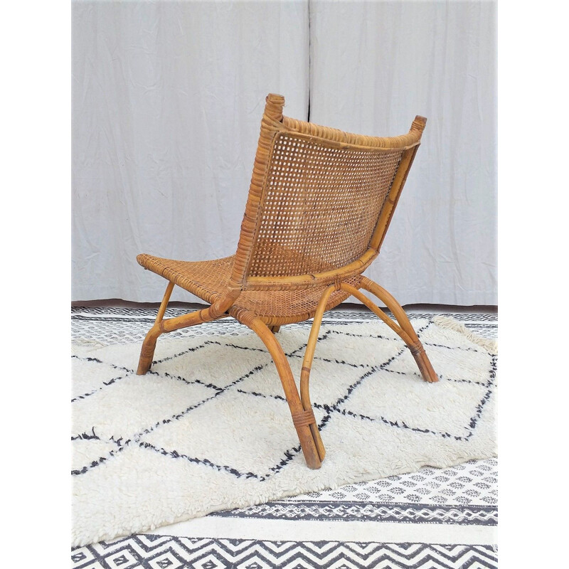 Vintage armchair in rattan 1970