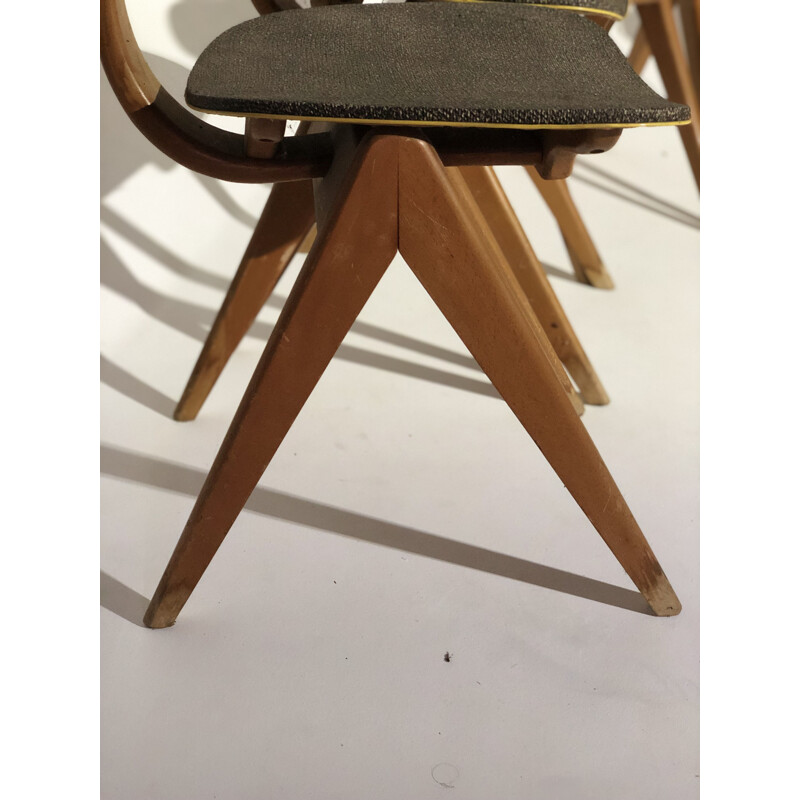Suite de 6 chaises Vintage en Skaï et bois