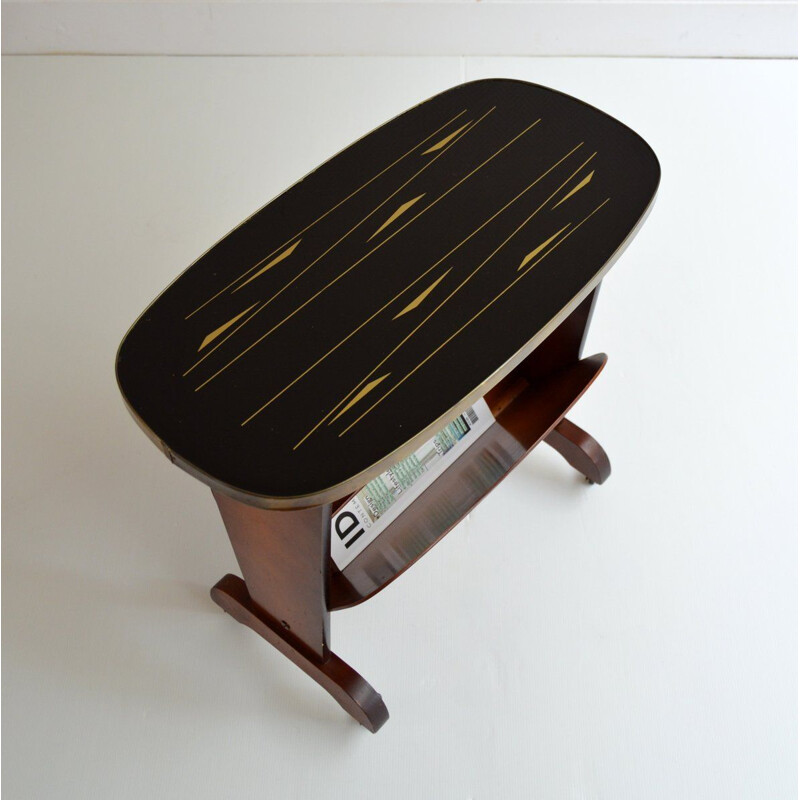 Vintage side table or magazine rack on wheels 1950s