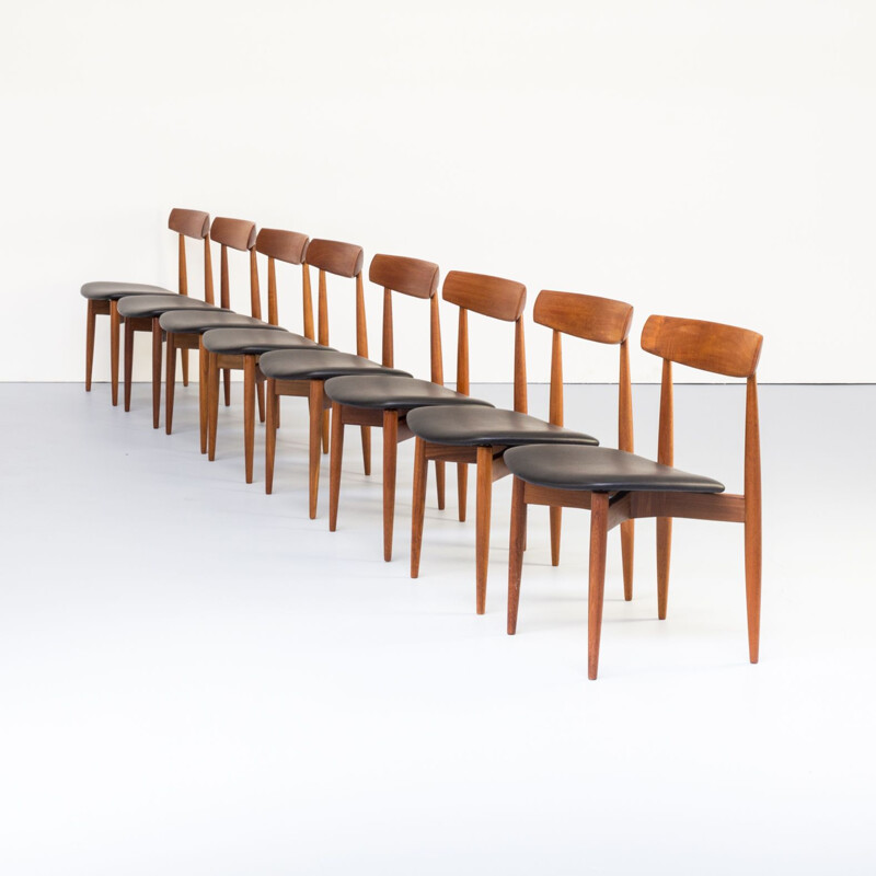 Set of 8 vintage chairs for Bramin in teak and black leatherette 1960s