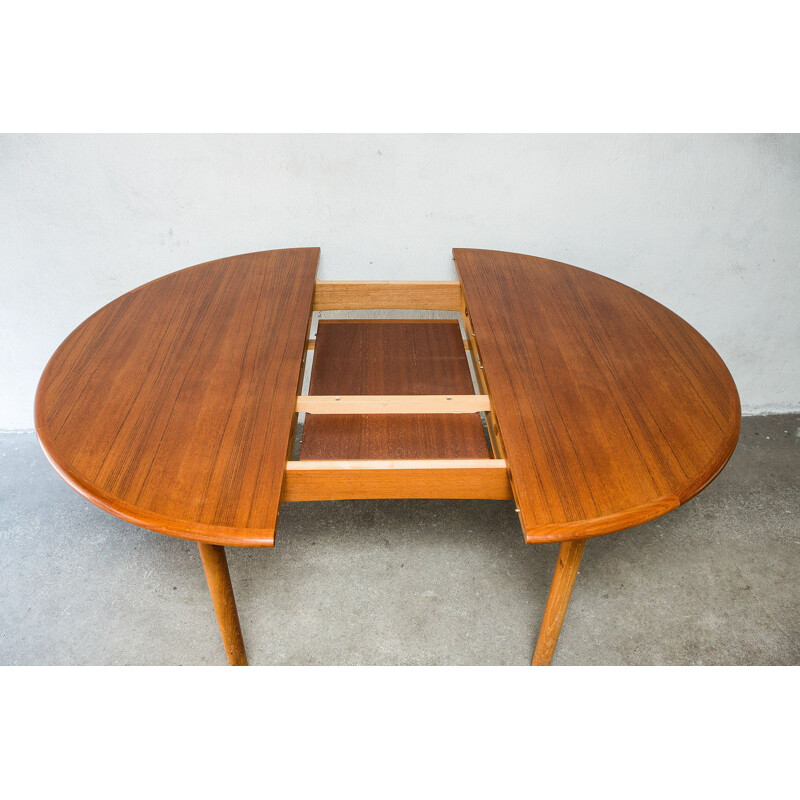 Vintage round Scandinavian dining table in teak with extension, 1960s 