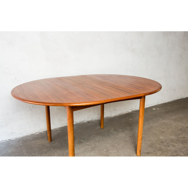 Vintage round Scandinavian dining table in teak with extension, 1960s 