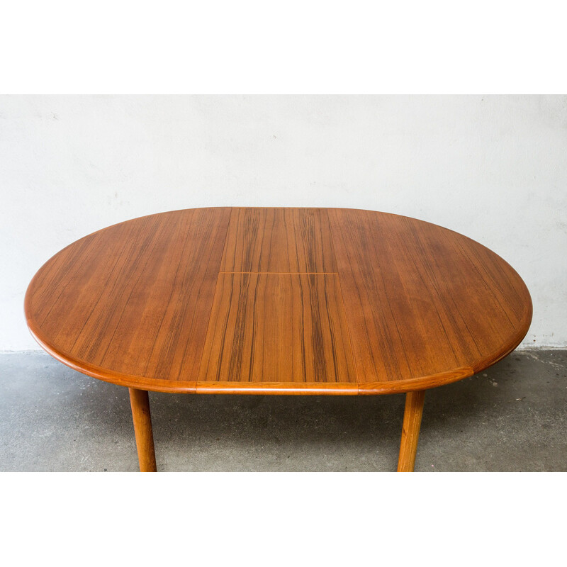Vintage round Scandinavian dining table in teak with extension, 1960s 