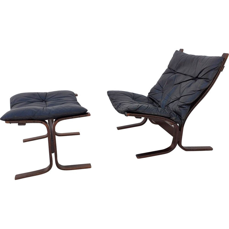 Siesta chair and ottoman in black leather by Ingmar Relling