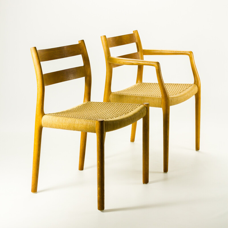 Set of 4 J.L. Mollers Mobelfabrik oak and paper cord chairs, Niels Otto MOLLER - 1976