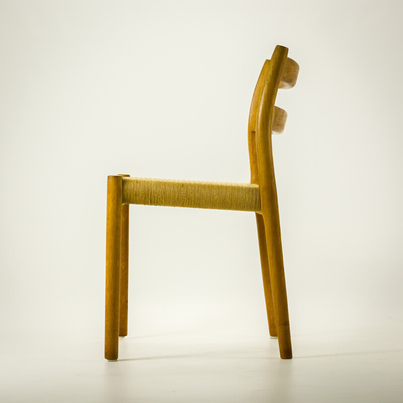 Set of 4 J.L. Mollers Mobelfabrik oak and paper cord chairs, Niels Otto MOLLER - 1976