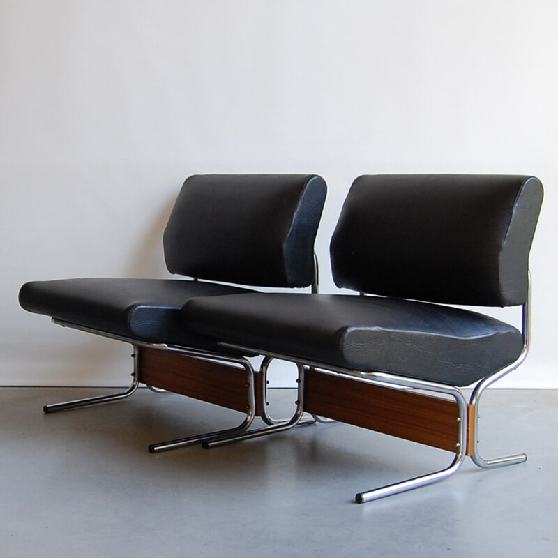 Vintage pair of black leatherette teak and low chairs 