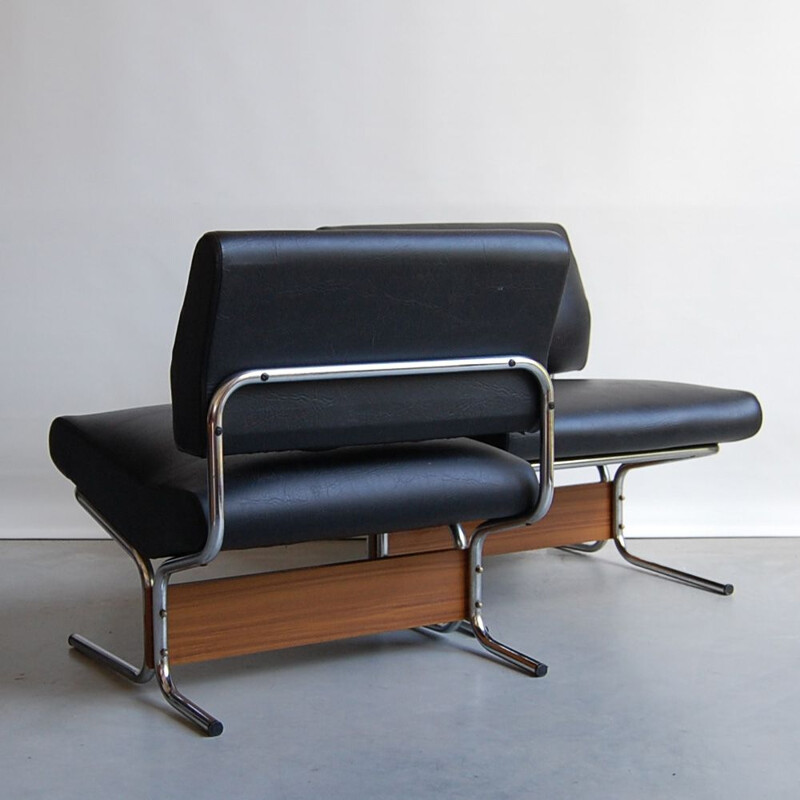 Vintage pair of black leatherette teak and low chairs 