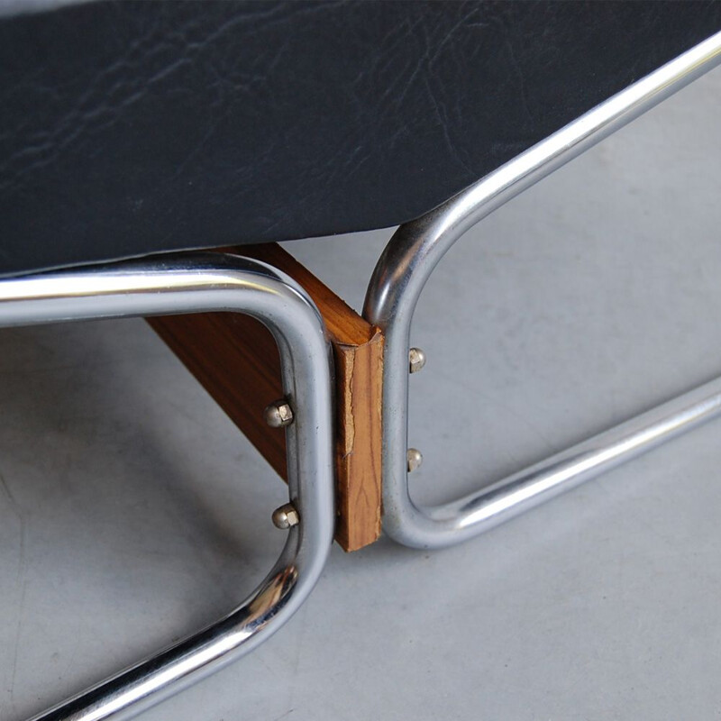 Vintage pair of black leatherette teak and low chairs 