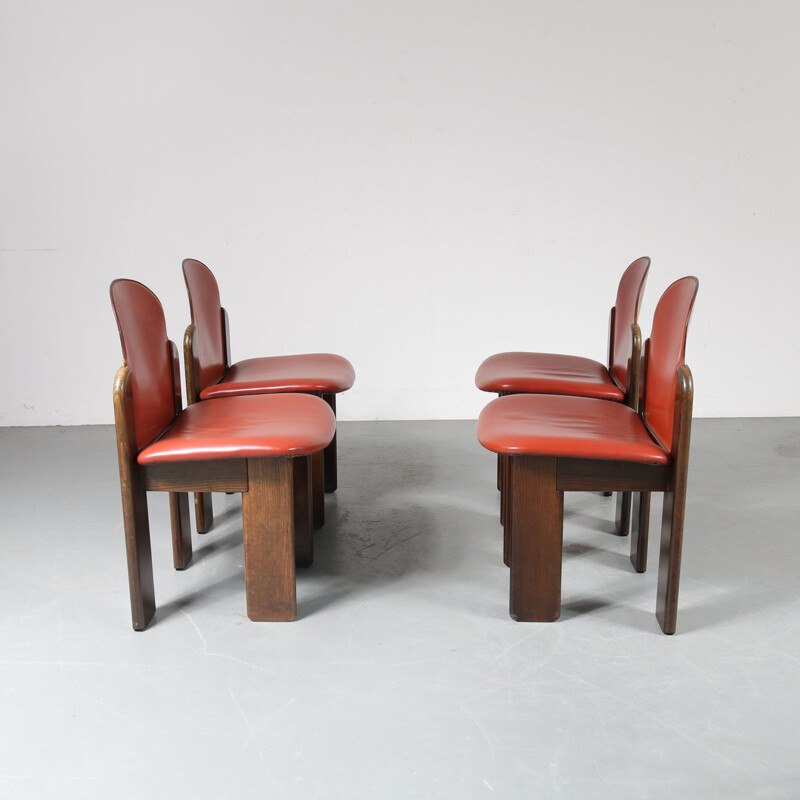 Vintage Set of 4 dining chairs in wood and red leather, Italy 1970s