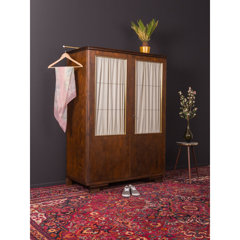 Vintage wooden wardrobe in glass