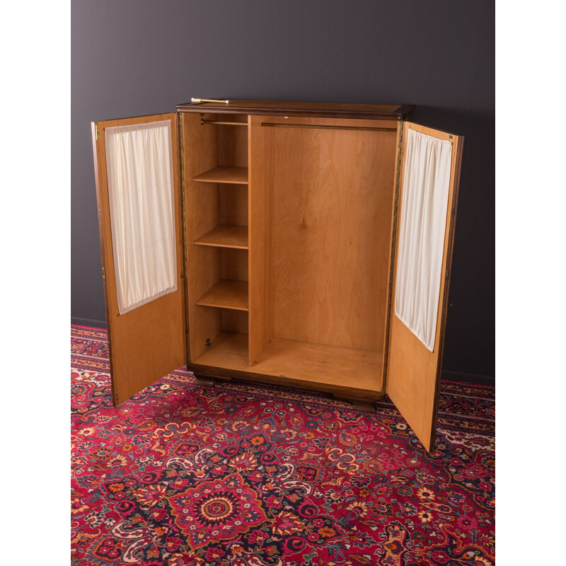 Vintage wooden wardrobe in glass