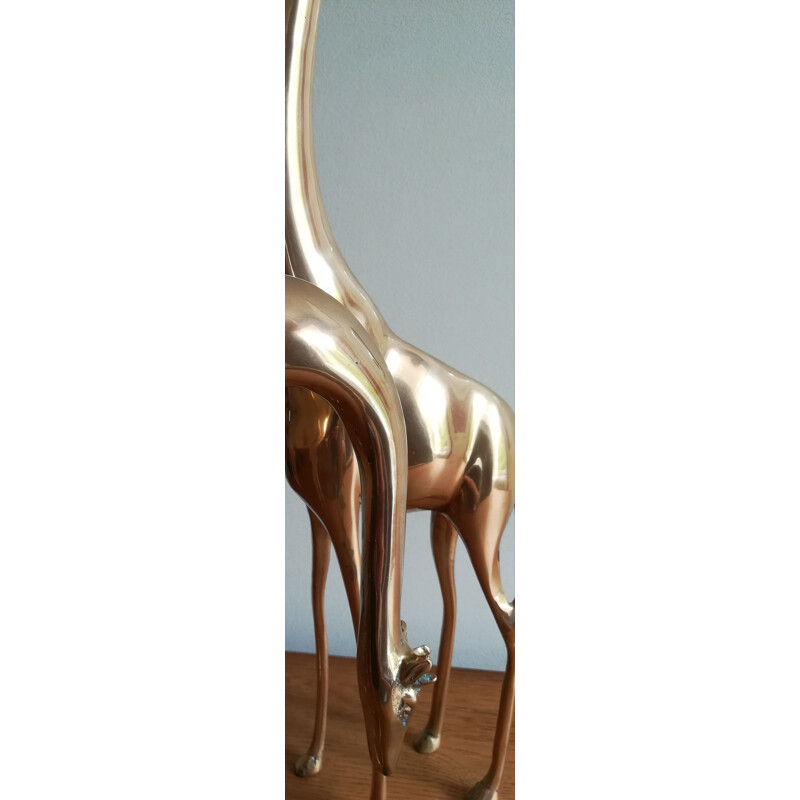 Paire de grandes girafes vintage en laiton