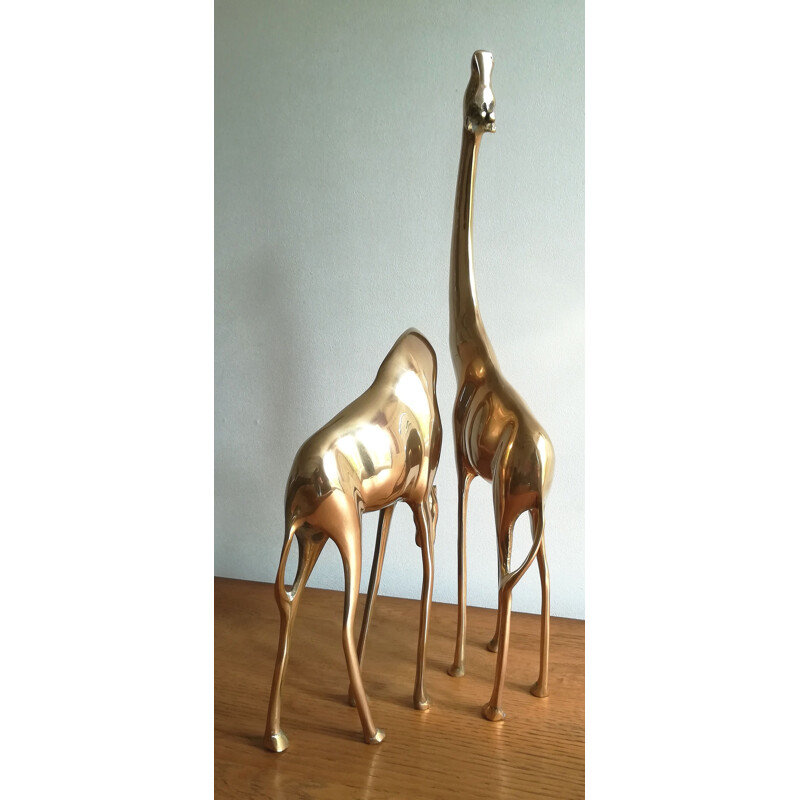 Paire de grandes girafes vintage en laiton