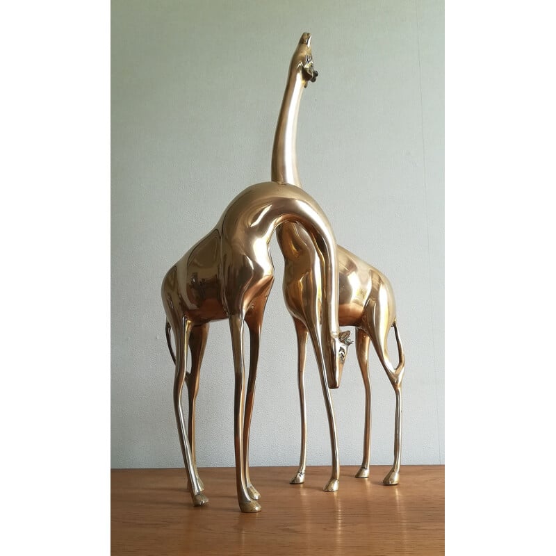 Paire de grandes girafes vintage en laiton