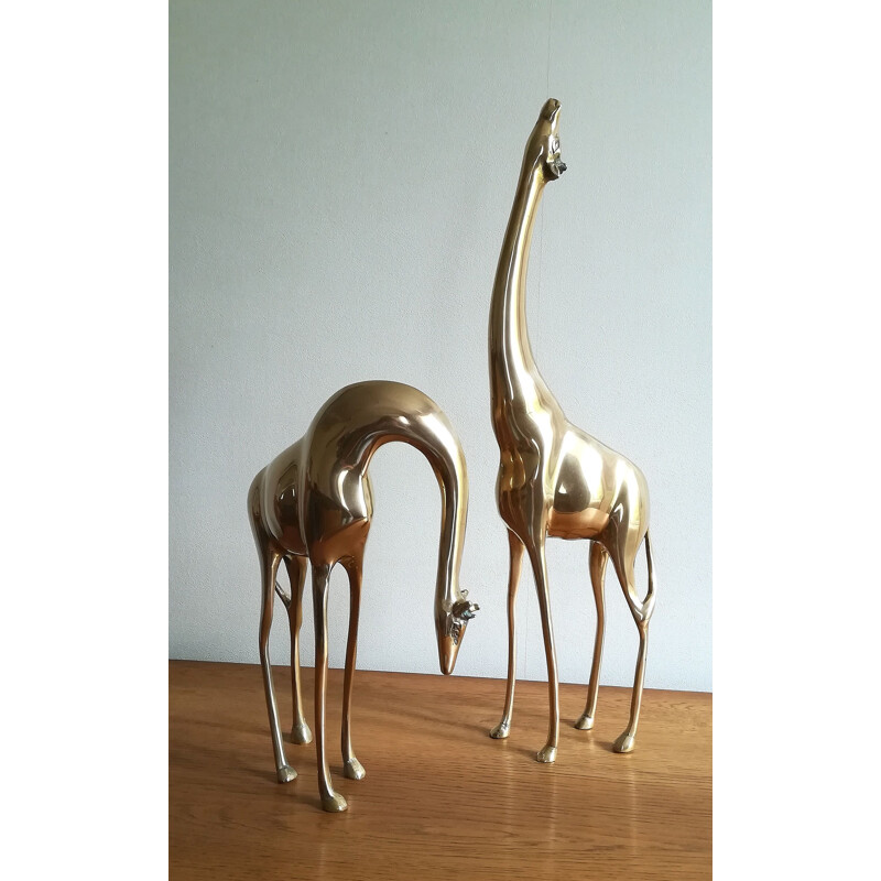 Paire de grandes girafes vintage en laiton
