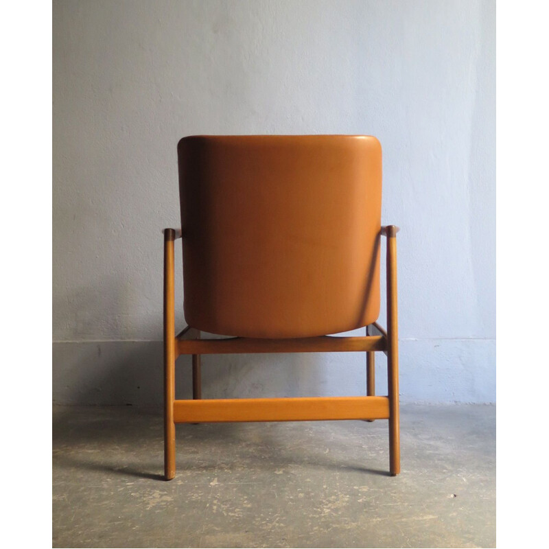 Vintage armchair in wood and leather, 1950s