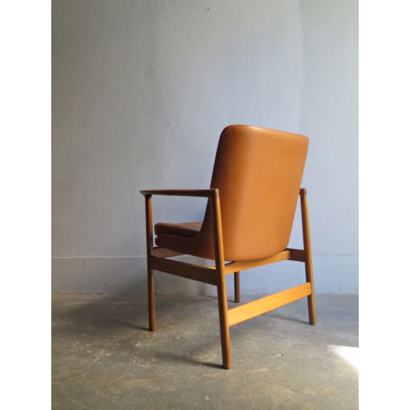 Vintage armchair in wood and leather, 1950s