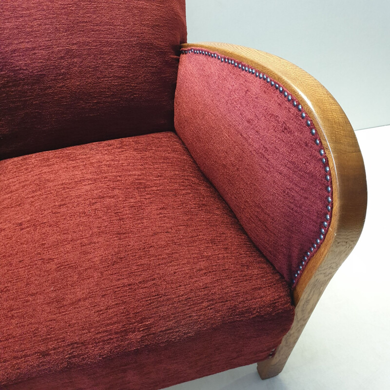 Vintage armchair with ottoman in oak and red fabric