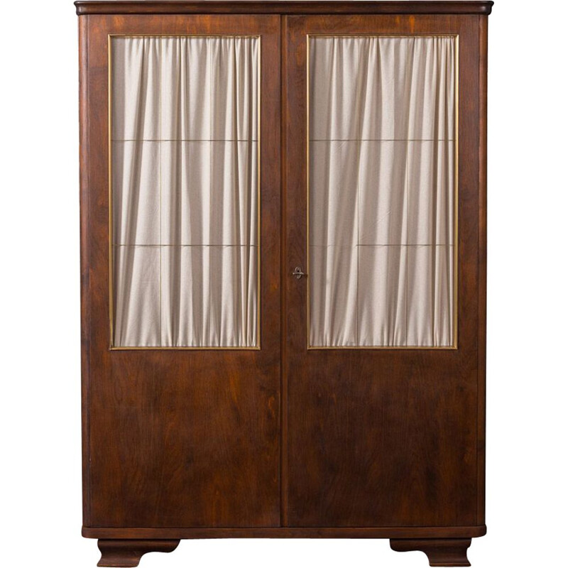 Vintage wooden wardrobe in glass